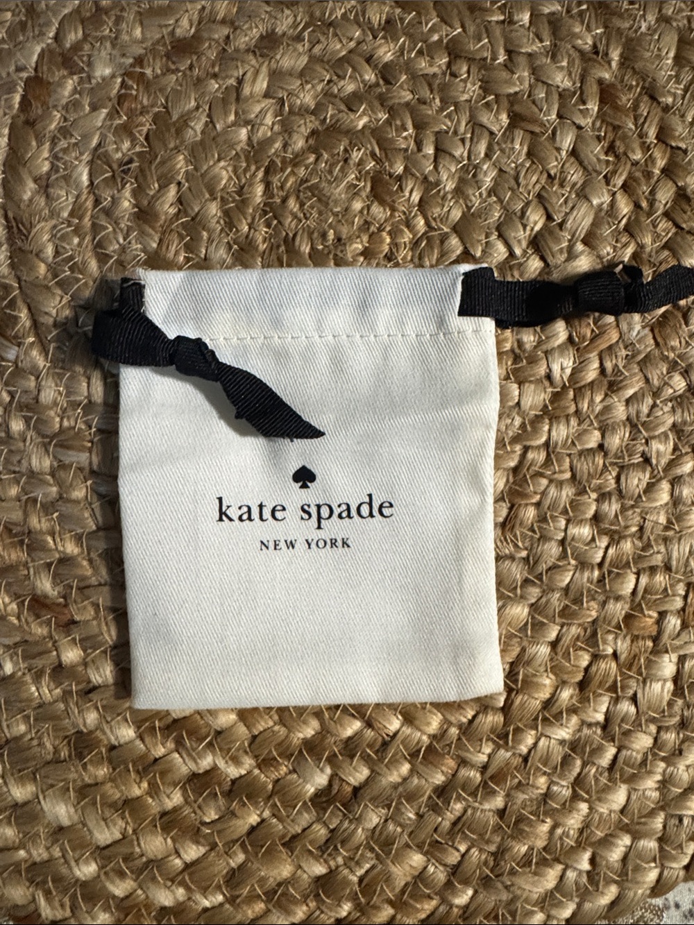 kate spade White Drawstring Jewelry Pouch with Black Ribbon